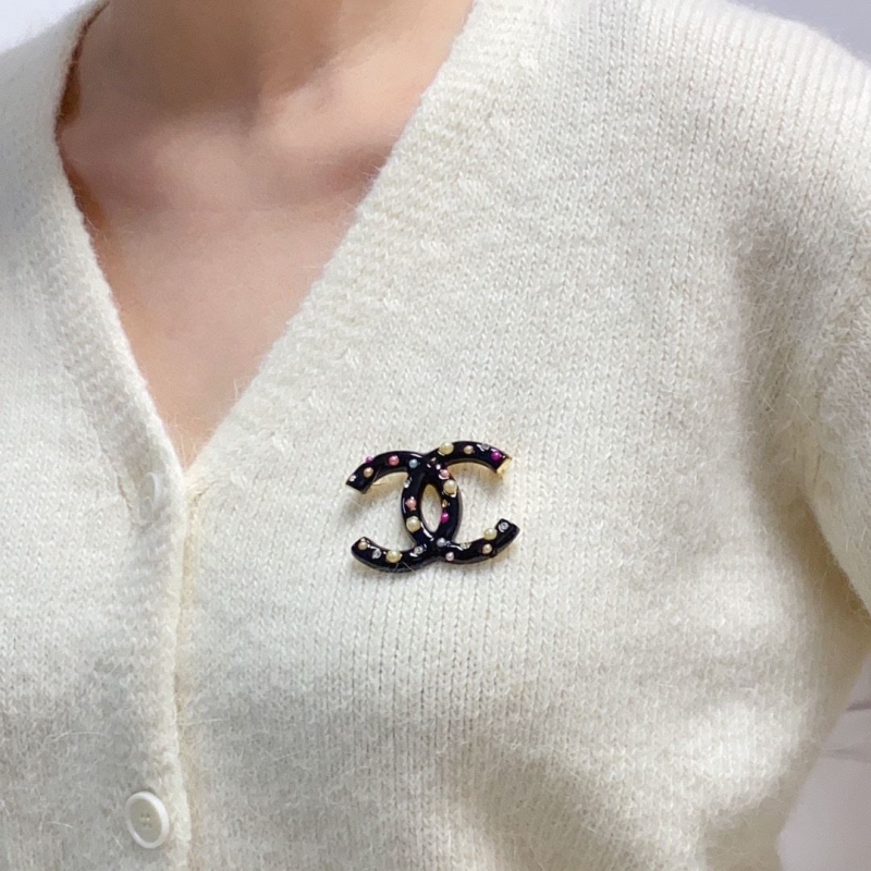 Ch**el brooches